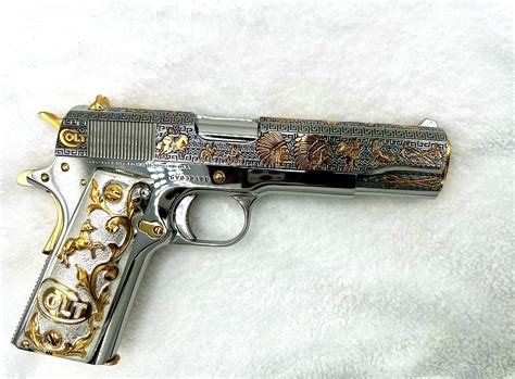 A 1911 pistol with gold-filled parts