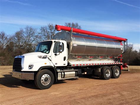 A close-up of a 1960s chicken feed truck's custom-built body