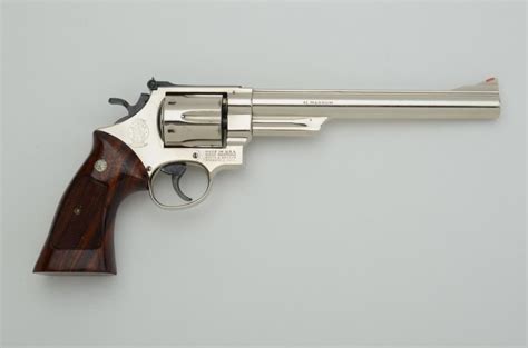 .41 Magnum handgun with accessories