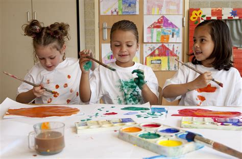 A person learning in a classroom at Pinot's Palette Puyallup