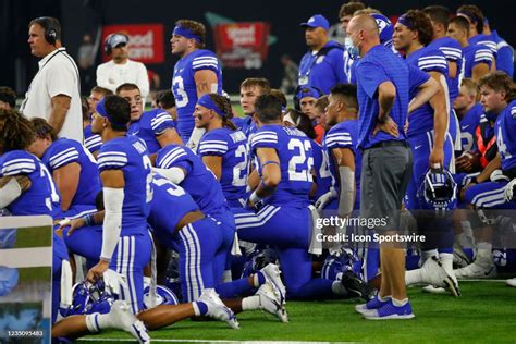 BYU football team huddle