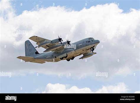 C-130 troop transport, with paratroopers preparing to jump