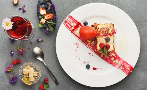 A beautifully presented dessert with fresh fruits and nuts