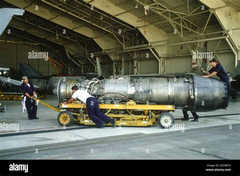 F-14 Tomcat maintenance on an aircraft carrier