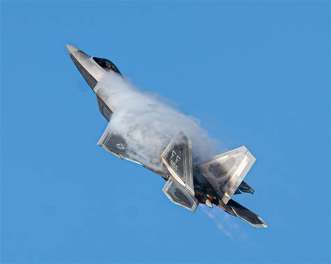 F-22 Raptor air show, showcasing its advanced aerodynamics and propulsion system