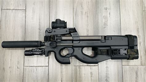 FN PS90 with Magpul RVG and SureFire M640V light