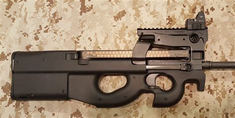 FN PS90 with tactical light and sling