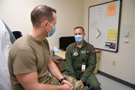 Flight Surgeon with a patient