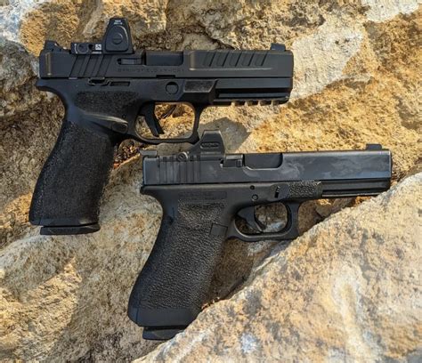 Glock vs Springfield handguns