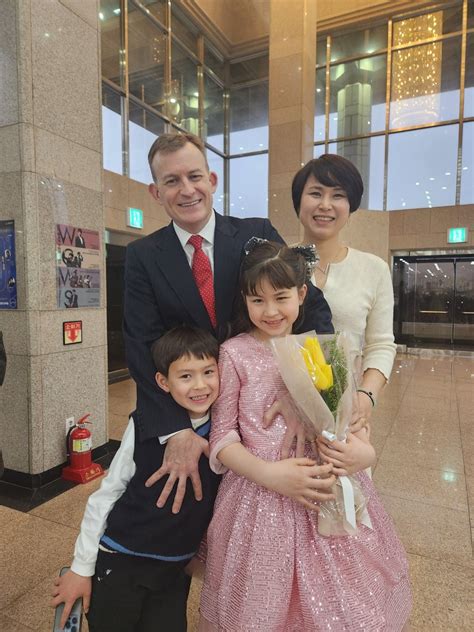 Robert E. Kelly and his family