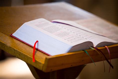 A priest delivering a sermon from a pulpit