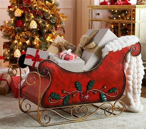 A festively decorated sleigh and reindeer display