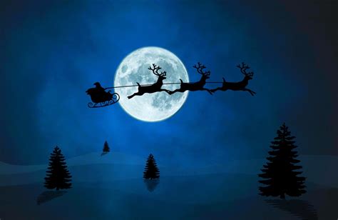 Sleigh Flying Through Night Sky