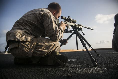 Sniper using night vision equipment