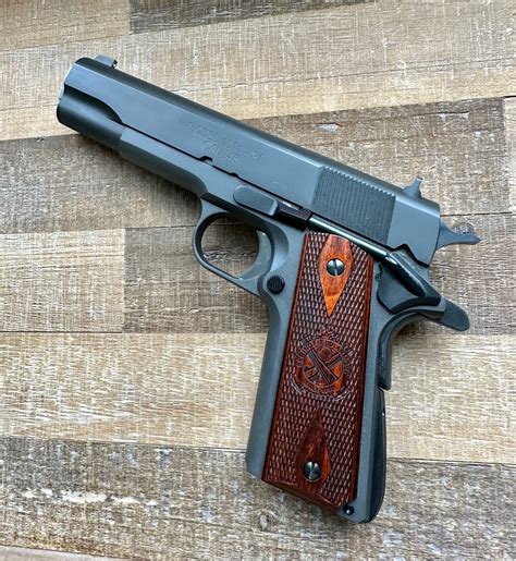 Springfield Mil-Spec 1911 pistol on a shooting range