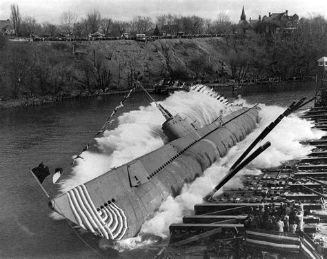 A photograph of a submarine sailing through the ocean