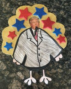 Trump in a turkey costume with a funny hat