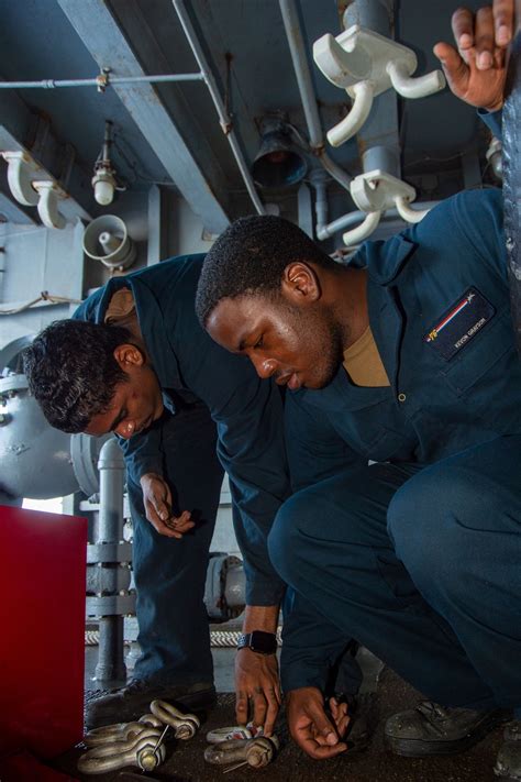 Sailors at work on USS Ronald Reagan