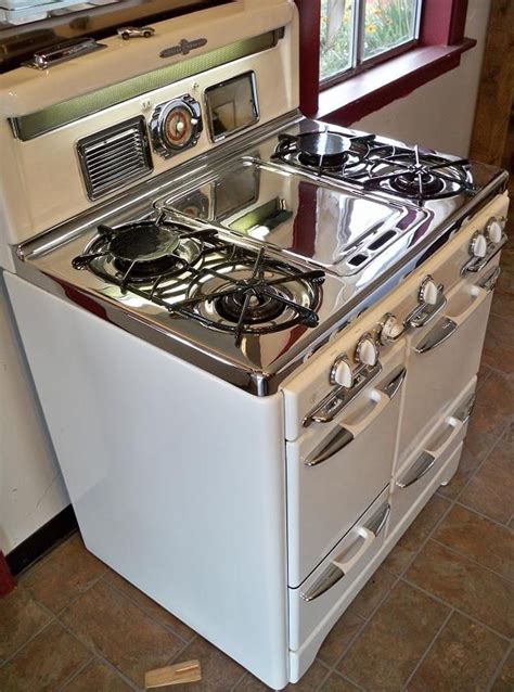 A vintage kitchen featuring 1950s appliances