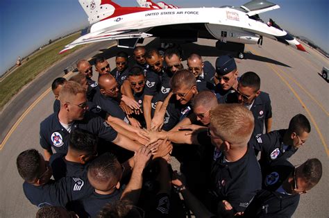 Air Force personnel working together as a team