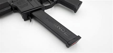 Amend2 Glock 27 drum magazine