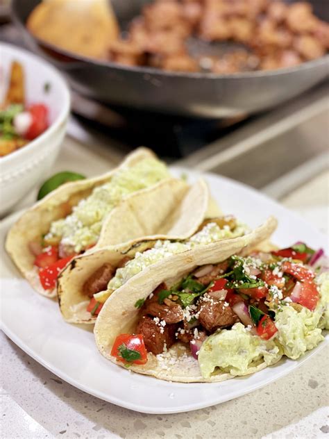 Delicious tacos filled with ancho chili peppers and seasoned beef