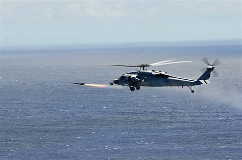 Apache Helicopter Firing Hellfire Missiles