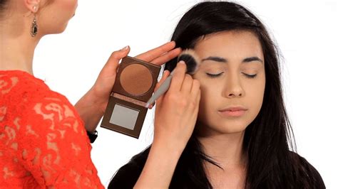 Applying Bronzer and Blush Palette