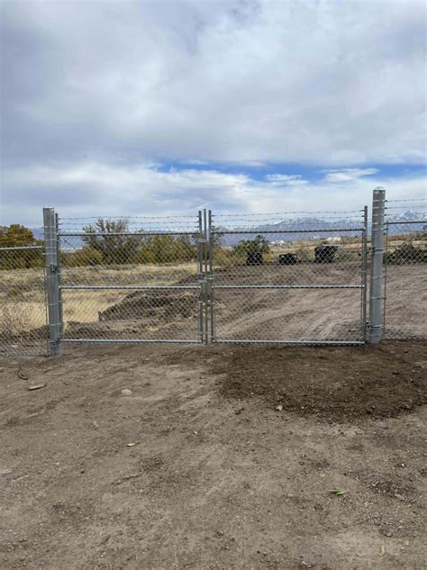 A barbed wire fence stretching across the American West