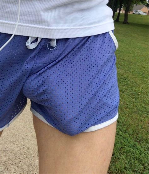 Man with a big bulge in shorts