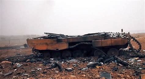 Blown up tanks in Syria