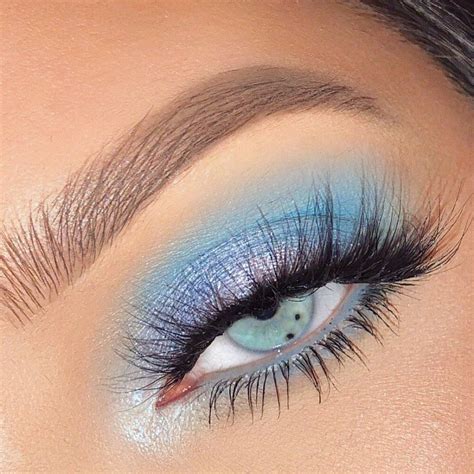 Dramatic evening look with blue eyes