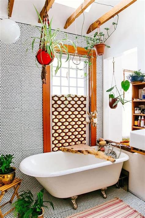 Terracotta-colored tiles and decor create a bohemian-inspired bathroom