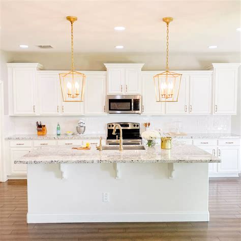 Bohemian off-white and gold kitchen with eclectic decor