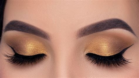 Brown eyes with golden eyeshadow