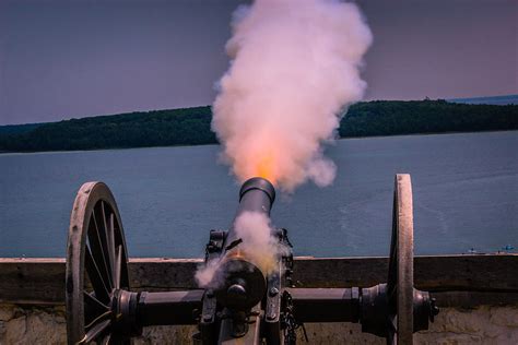 Cannons firing during a battle