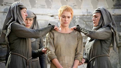 The Septons and Septas of the Faith Militant hurl insults and stones at Cersei as she walks.