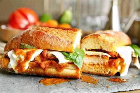 Chicken parmesan sub sandwich with marinara sauce and melted mozzarella