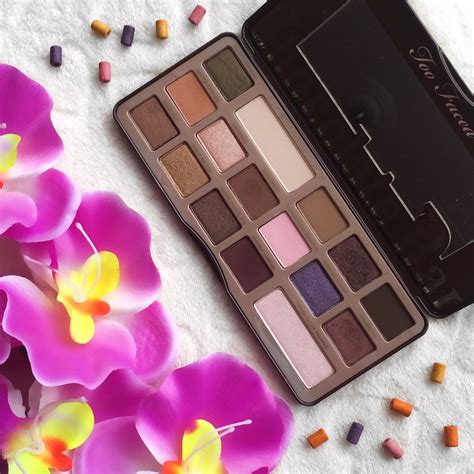 A chocolate bar eyeshadow palette featuring shades of brown, gold, and neutral tones