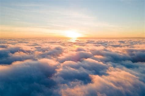 Clouds reflecting on the sea where it meets the sky