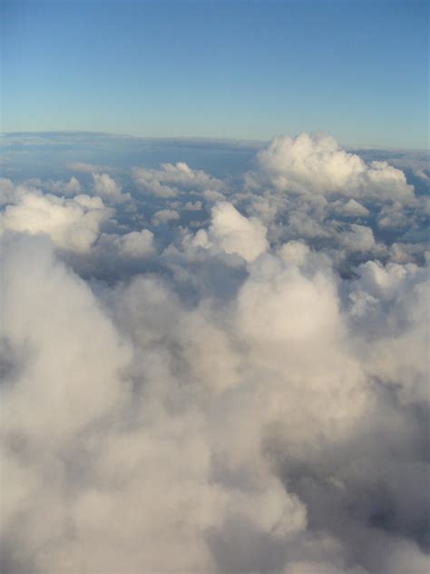 A dynamic landscape of clouds where the sea meets the sky