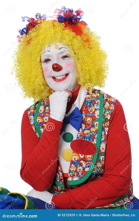 A clown wearing a yellow wig