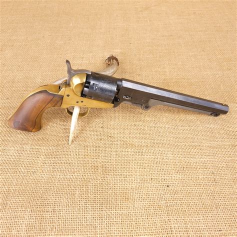 A replica Colt 1851 Navy revolver on display