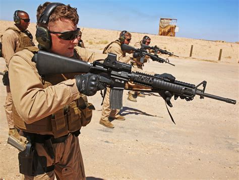 Soldiers training with combat assault rifles