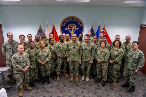 Airmen from the 6th Communications Squadron work on a satellite communications project