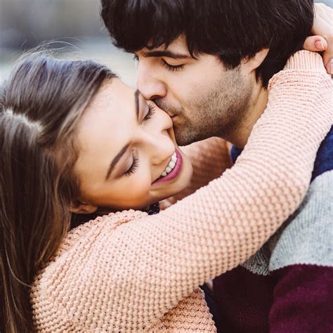 A couple embracing and looking into each other's eyes