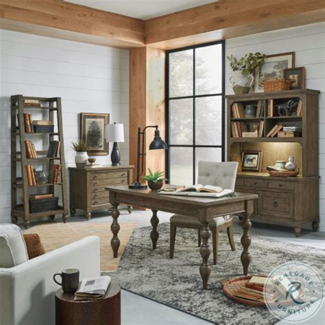 An office with cream-colored walls and taupe-colored furniture