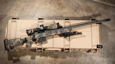 Custom Remington 700 rifle with stock and scope