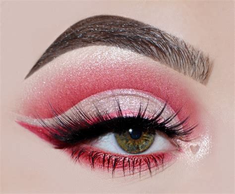 A cut crease look featuring a light shade on the lid and a darker shade in the crease