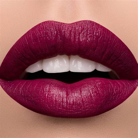 Deep berry shades are a great way to add a pop of color to blue eyes.